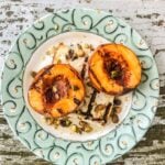 Grilled peaches with paneer on a plate