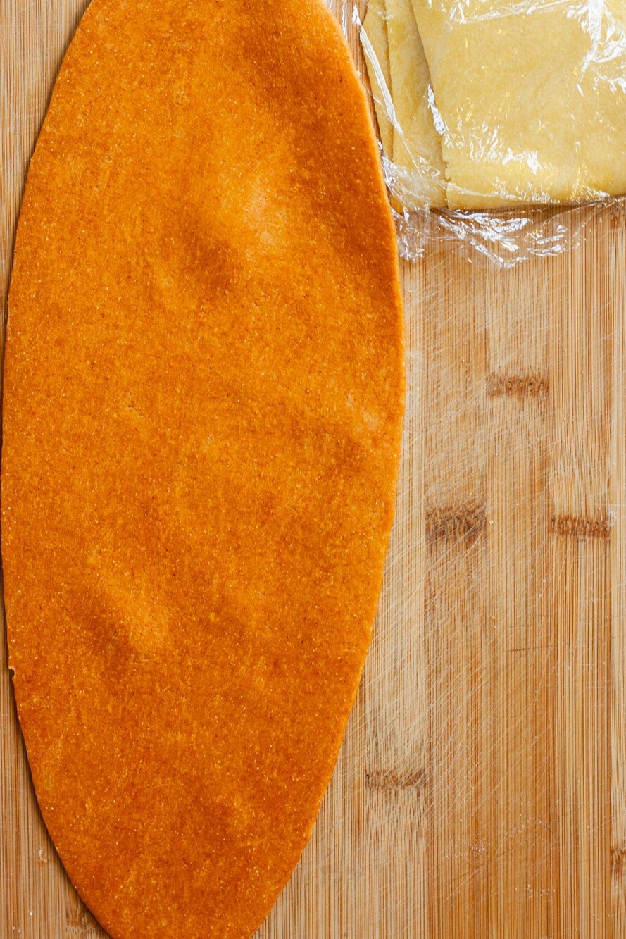 Ovular dough on a cutting board.