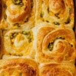Jalapeno Cheese Buns in a baking pan.