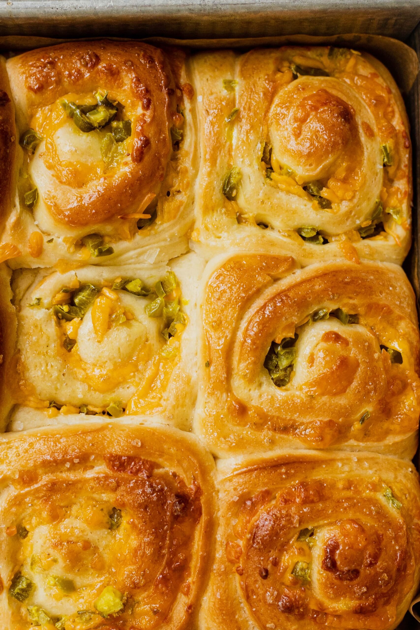 Jalapeno Cheese Buns in a baking pan.
