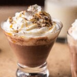 Amaretto hot chocolate with whipped cream and salted caramel.