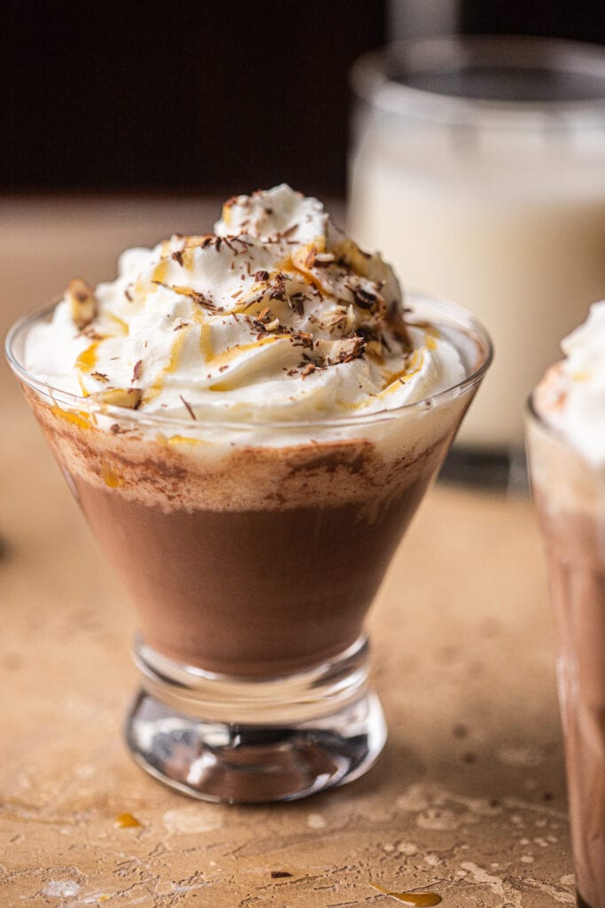 Amaretto hot chocolate with whipped cream and salted caramel.