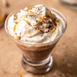 close-up shot of hot chocolate with amaretto and whipped cream