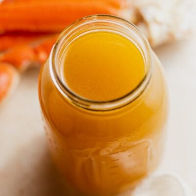 Mason jar with seafood stock.