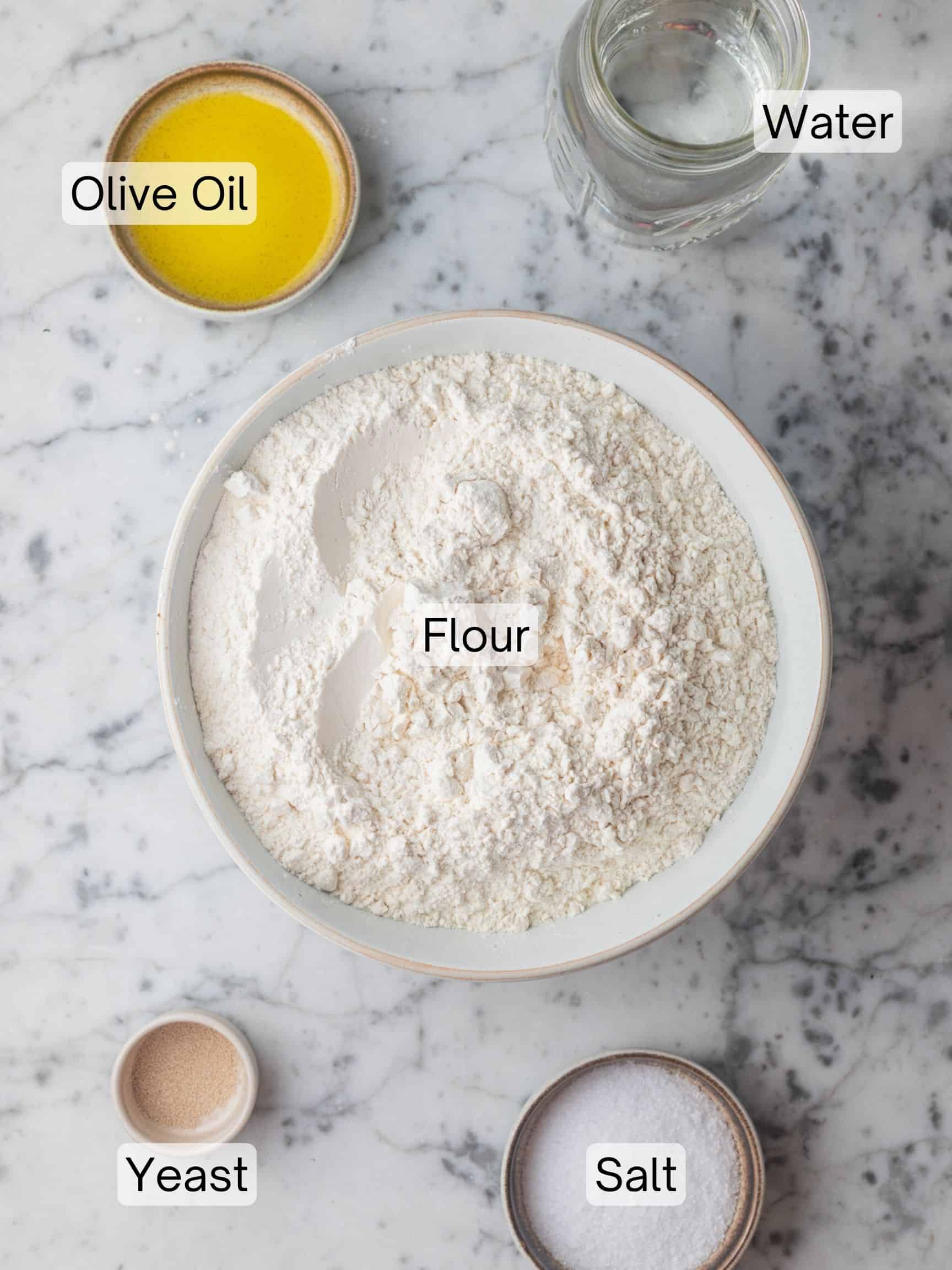 Ingredients laid out to make cold fermented pizza dough.
