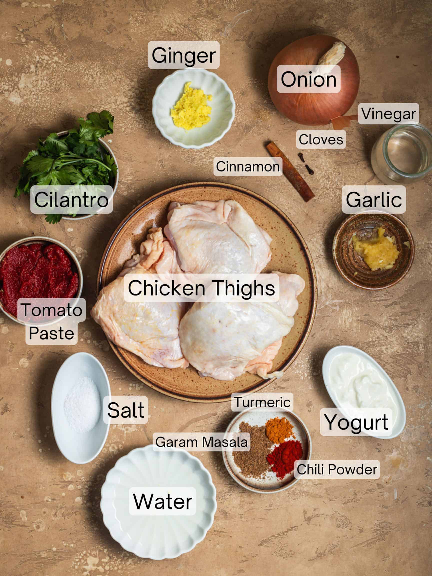Ingredients laid out to make baked chicken curry.
