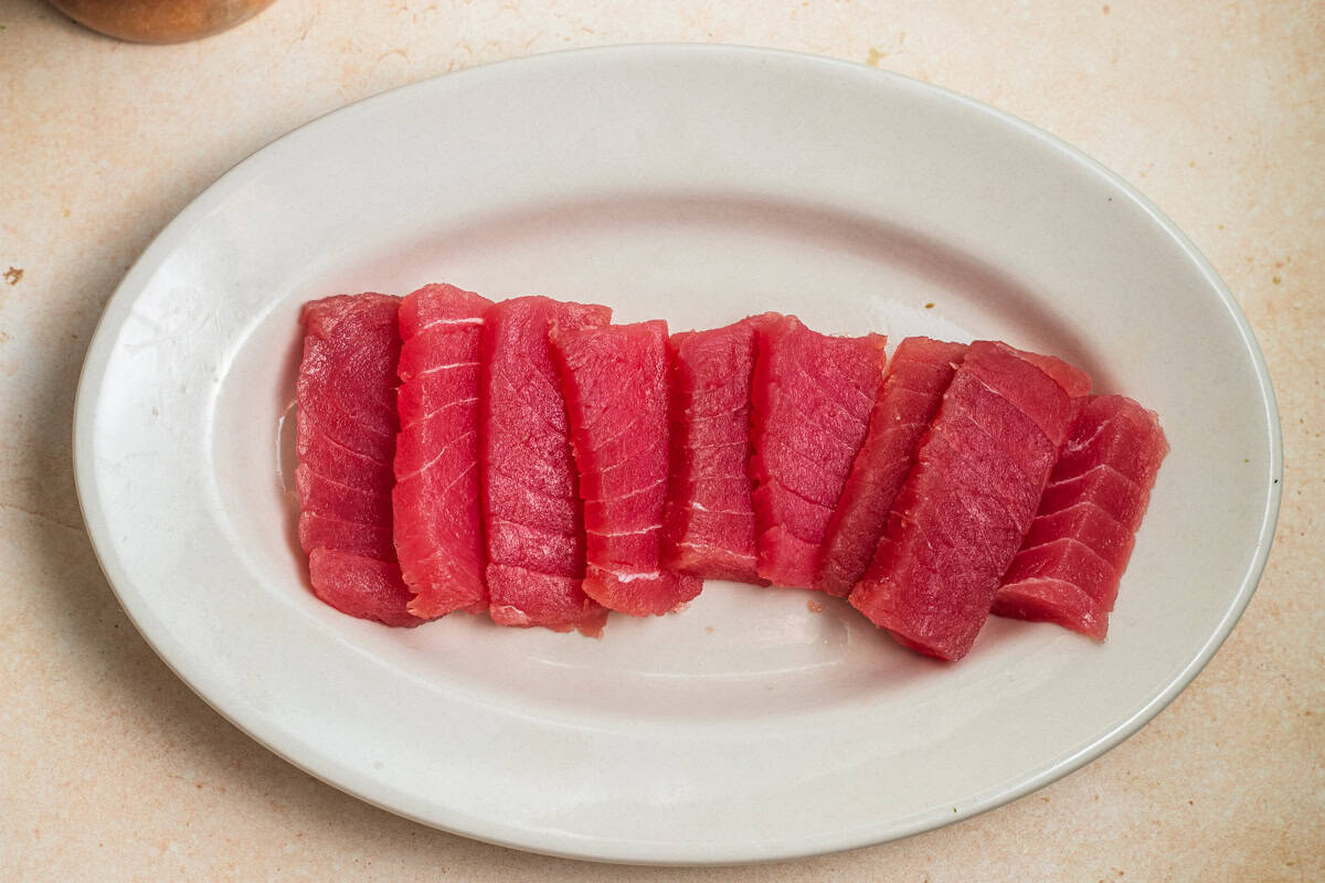 A plate of tuna sashimi. 