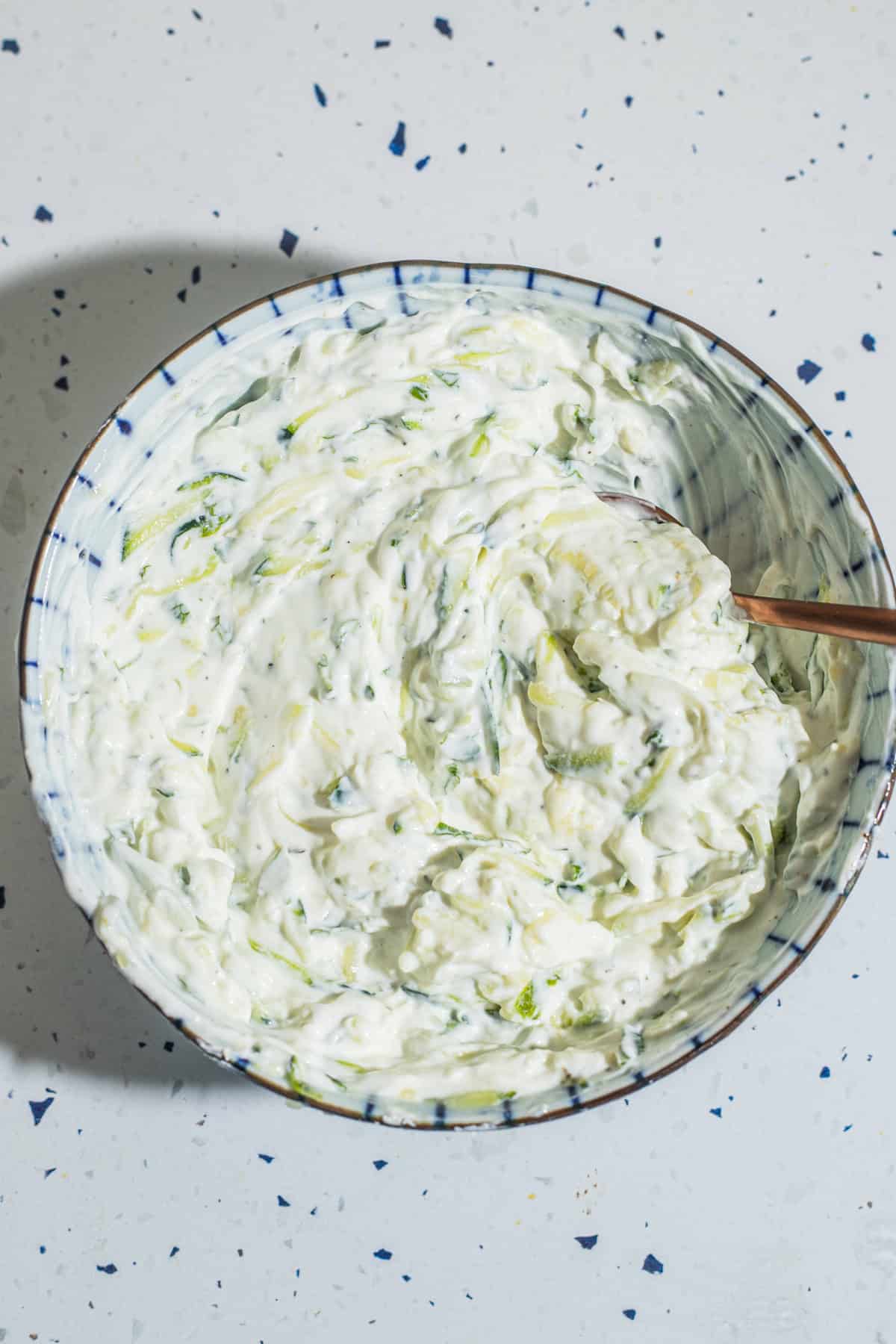 A bowl of zucchini tzatziki.