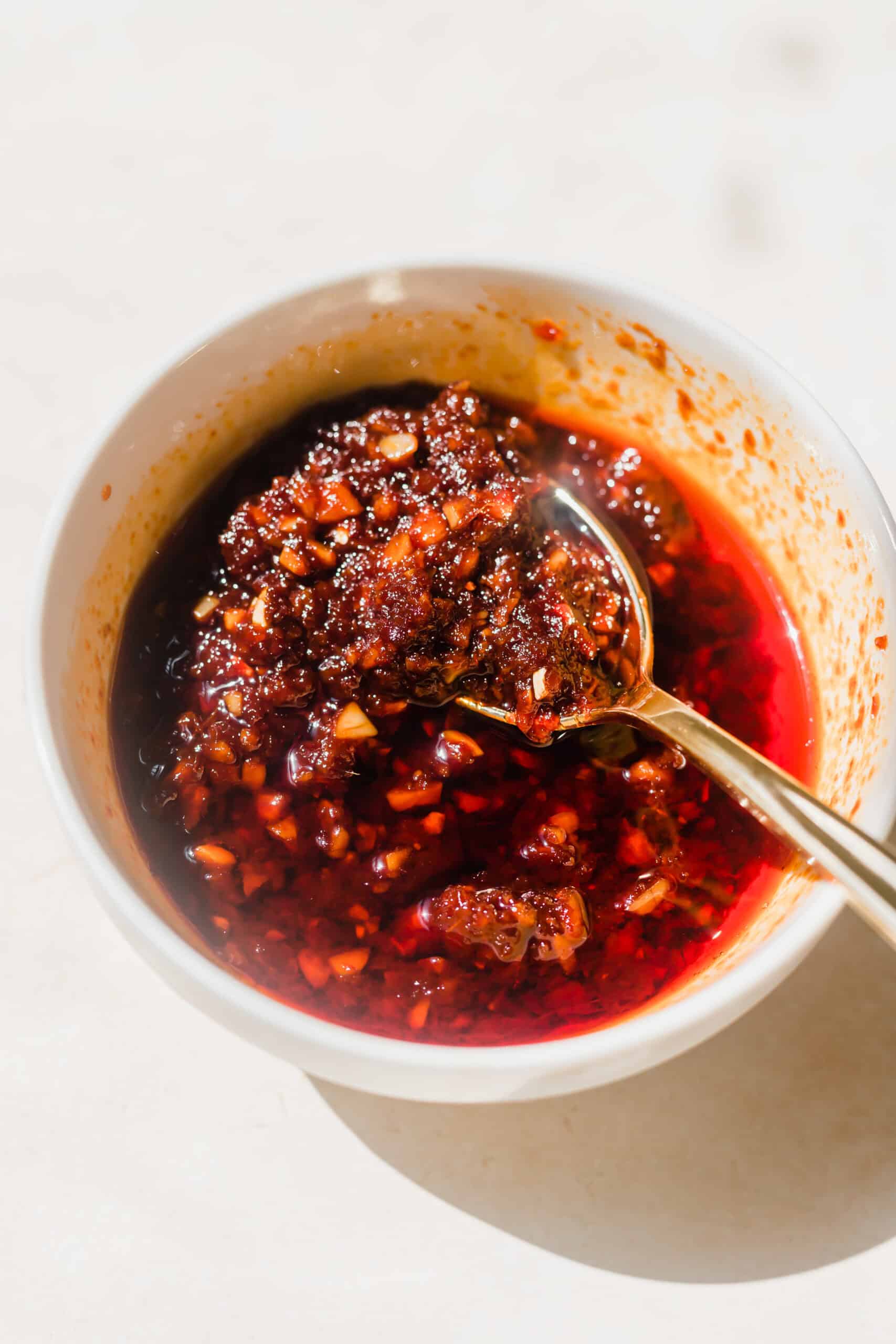 A bowl of homemade chili paste for chili paneer.